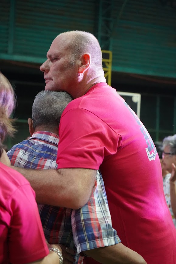 A close embrace during the prayer.