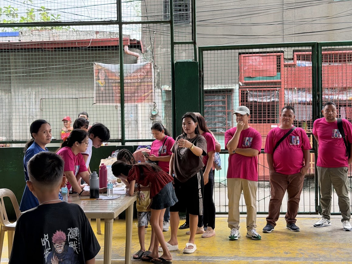 Team members at the registration table.