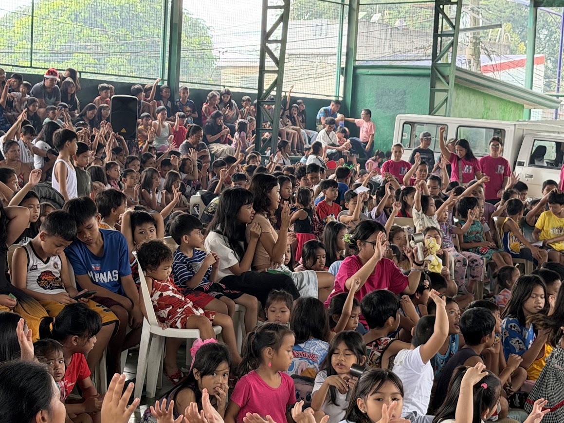 Hands up across the stands and the floor.