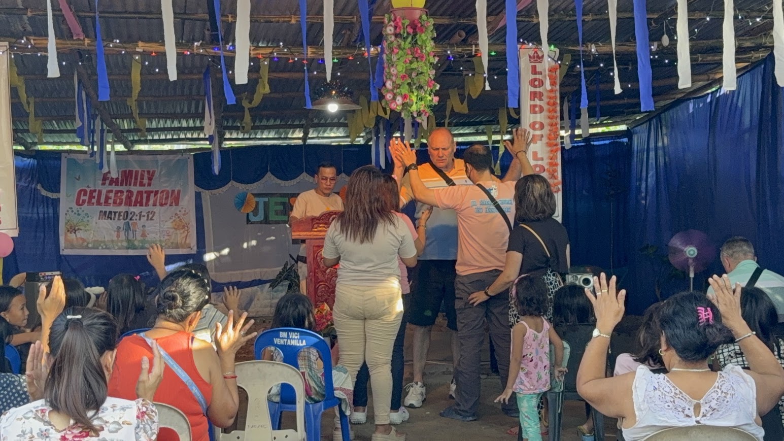 An individual blessing during the Family Celebration gathering.