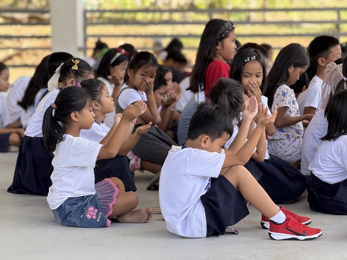 Clapping along together.