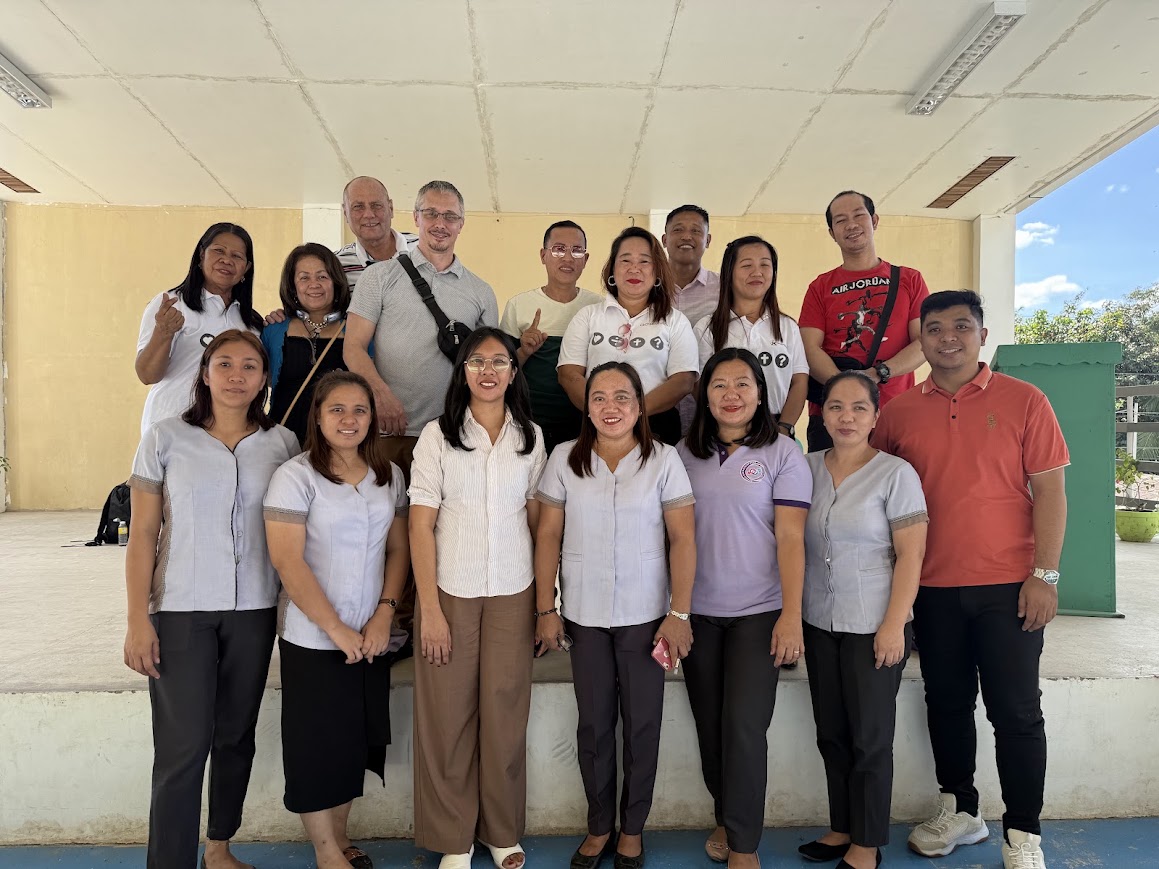 The team with local staff and partners.