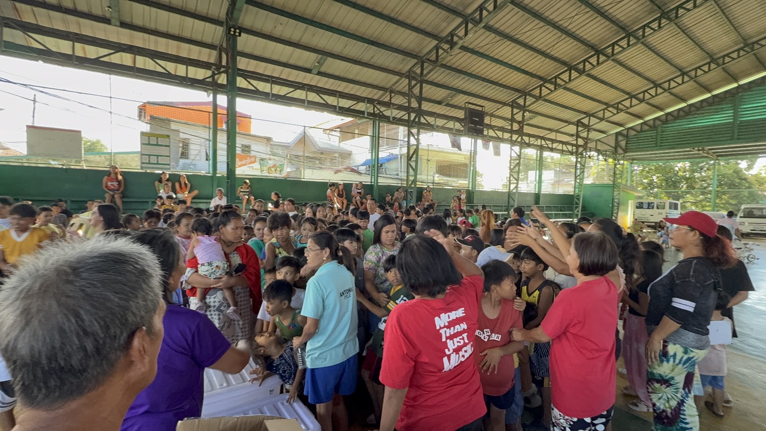 Hands go up around the distribution point.