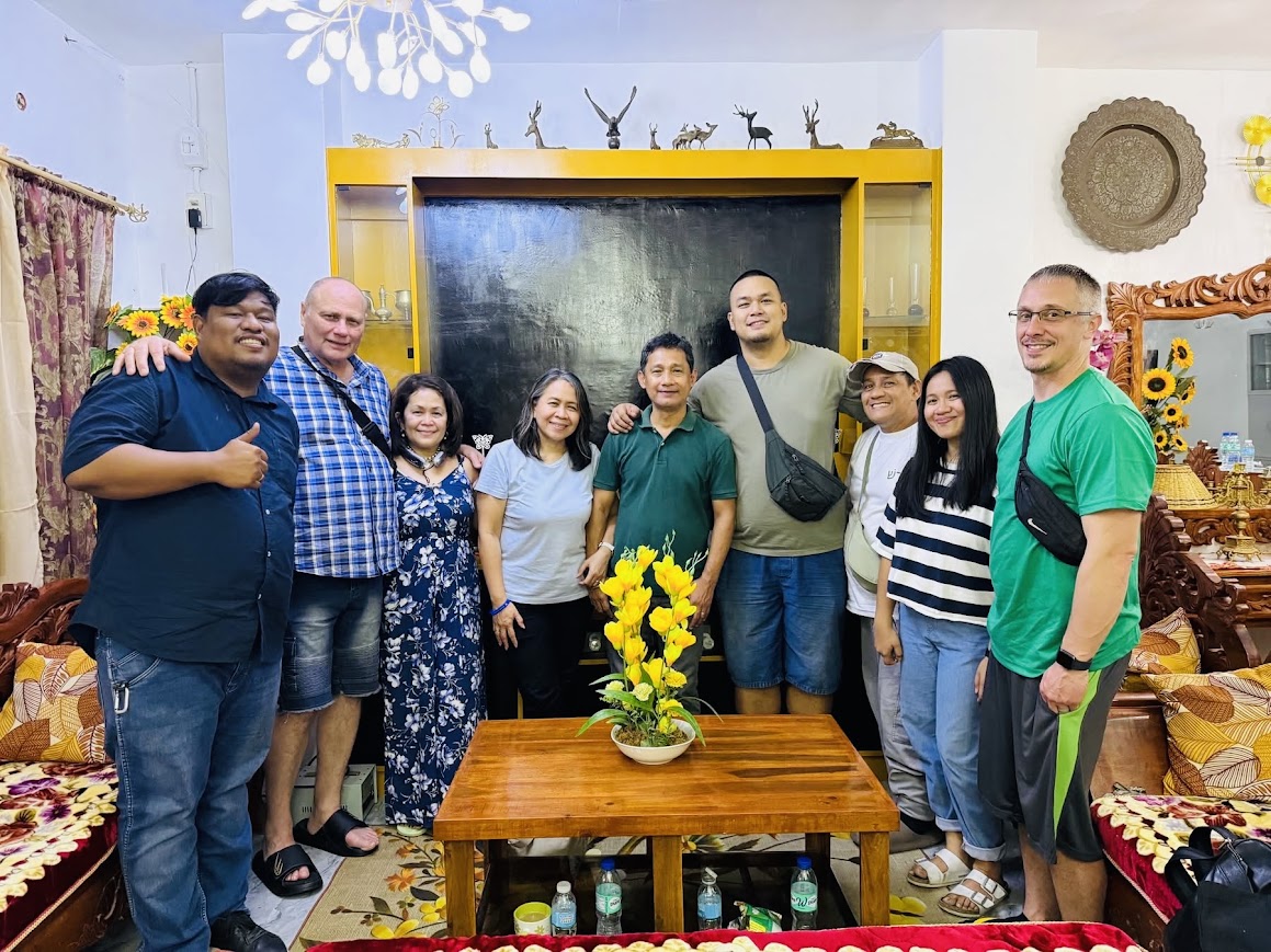 Another frame from the living room gathering.